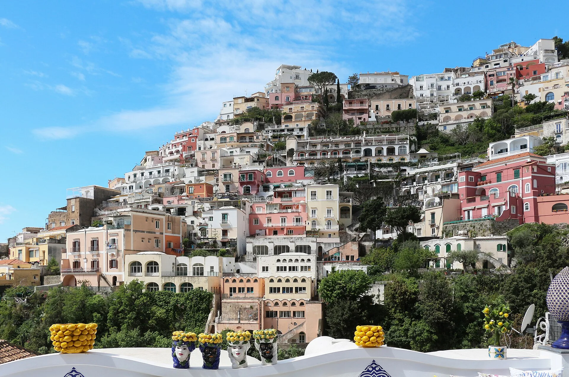 The pastel cliffside village of Positano tumbling down to a turquoise sea on the Amalfi Coast