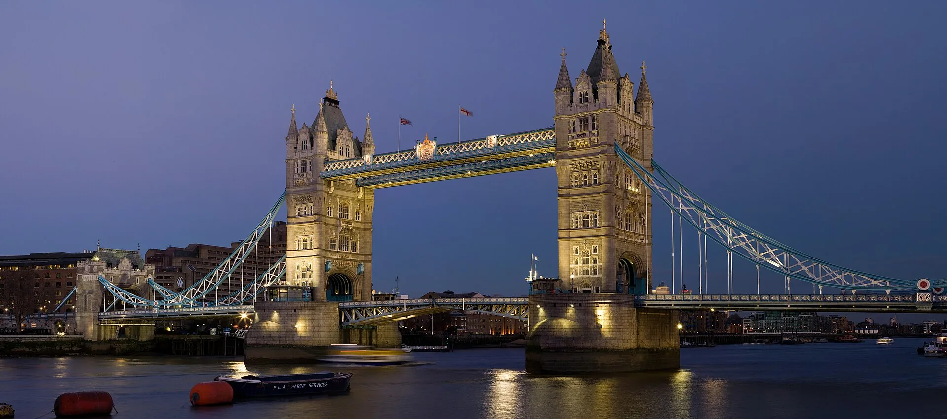 Tower Bridge over the River Thames in London lit at dusk