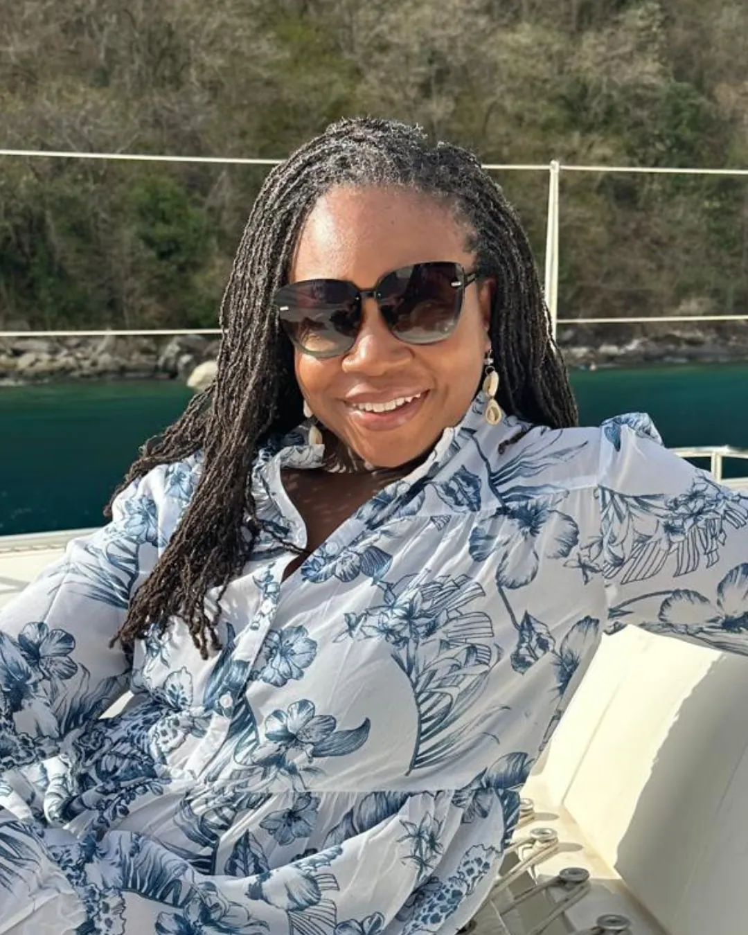 A retreat guest relaxing on deck during a catamaran day in Saint Lucia